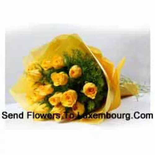 Bukiet 19 żółtych róż z sezonowymi wypełniaczami
