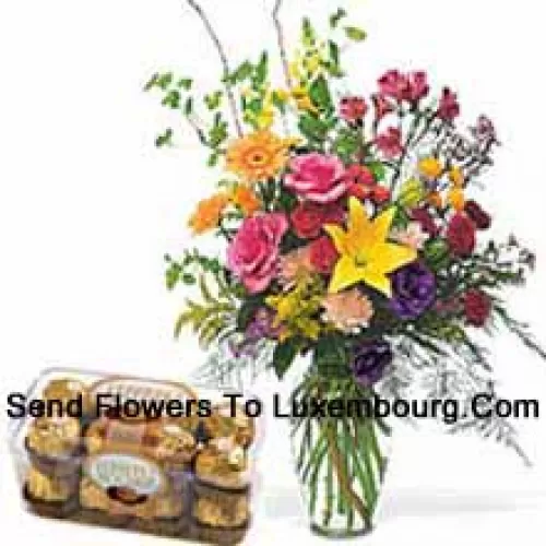 أزهار متنوعة في إبريق مع 16 قطعة فيريرو روشيه